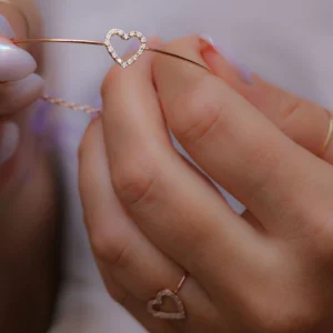 Bracciale Filodamore in Oro Rosa 9kt e Cuore in Oro Bianco 9kt con Diamanti Bianchi | Rubinia Gioielli Hot